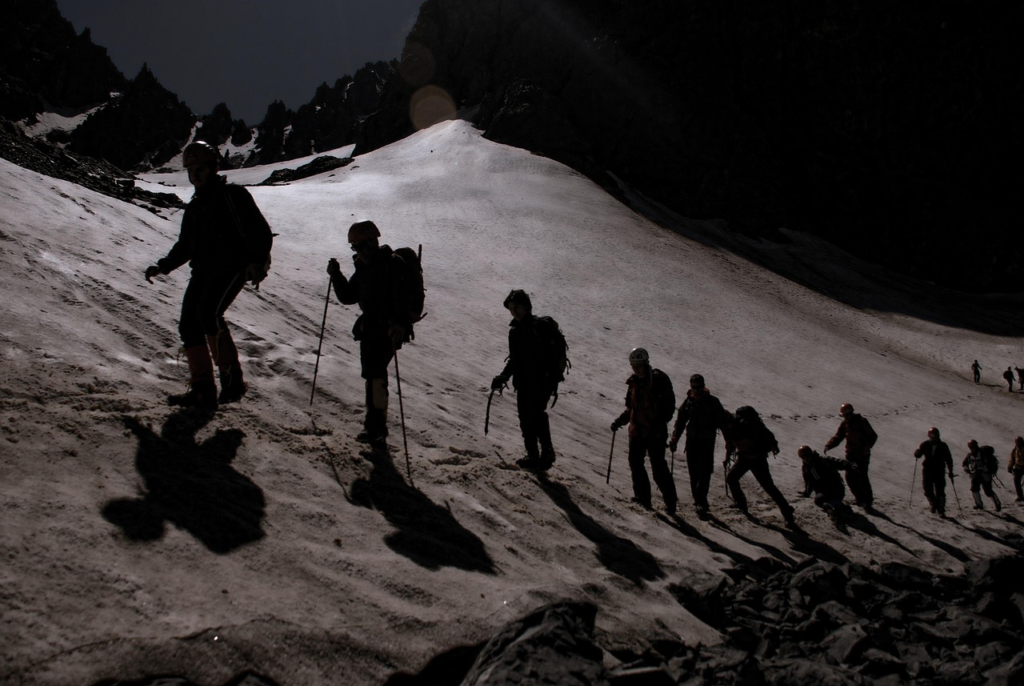 Climbers descending safely on mountain ridge